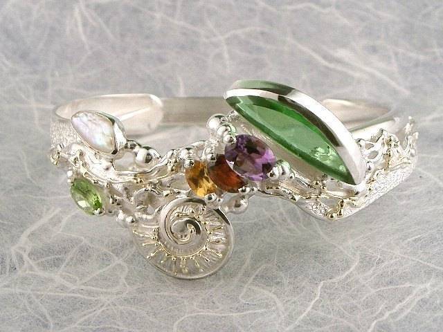 jewelry shown in international jewelry fairs and and exhibitions, bracelet handcrafted and made by artist, bracelets sold in art and craft galleries, mixed metal handcrafted jewelry, bracelet made from silver and gold, gregory pyra piro handcrafted bracelet 2060