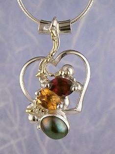 artisan made handcrafted jewelry,, jewellery with colour stones, jewellery with natural gemstones, jewellery with real pearls, where to buy jewellery for mature womens, jewellery from mixed metals with gemstones, facet cut citrine and #Garnet #Pendant 6593