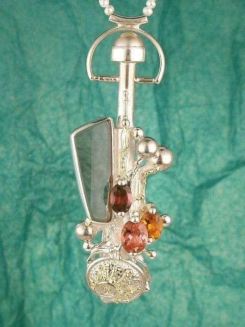 artisan made handcrafted jewelry,, jewellery with colour stones, jewellery with natural gemstones, jewellery with real pearls, where to buy jewellery for mature womens, jewellery from mixed metals with gemstones, facet cut amethyst and blue topaz perfume Bottle Pendant 6384