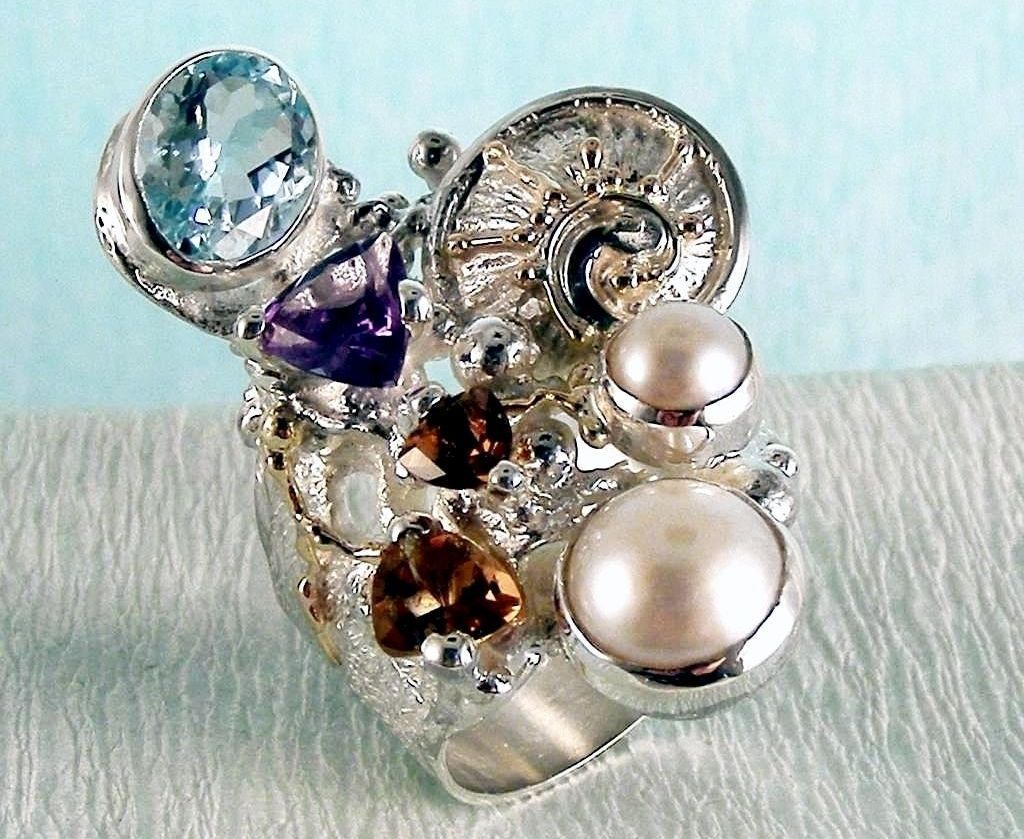 fine craft gallery rings for sale, original handcrafted maker's jewellery rings for sale, gregory pyra piro handcrafted ring 2050, mixed metal artisan handcrafted jewellery, handcrafted rings for women with amethyst, designer jewellery and fine jewellery at auctions with garnet, handcrafted rings for women with tourmaline, artisan rings for women with blue topaz, rings with gemstones and pearl, original handmade rings, one of a kind jewellery, handmade jewelry with natural pearls and stones with gemstones and pearls, art jewellery with gemsteons and pearls