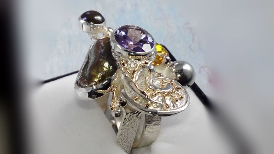 original maker's handcrafted jewellery, gregory pyra piro ring 1565, mixed metal jewelry, 14k gold and silver, sterling silver and 14 karat gold, artist with own style, unique style jewelry, silver and gemstone jewelry, gemstone and pearl jewelry, gold and color gemstone jewelry, peridot, citrine, amethyst, pearls, art nouveau inspired fashion jewelry, jewellery with natural pearls and semi precious stones, contemporary jewelry from silver and gold, art jewellery with colour stones, contemporary jewelry with pearls and color stones, jewellery made from silver and gold with natural pearls and natural gemstones, shopping for diamonds and designer jewellery, accessories with color stones and pearls, artisan handcrafted jewellery with natural gemstones and natural pearls, jewelry made first hand, art and craft gallery artisan handcrafted jewellery for sale, jewellery with ocean and seashell theme