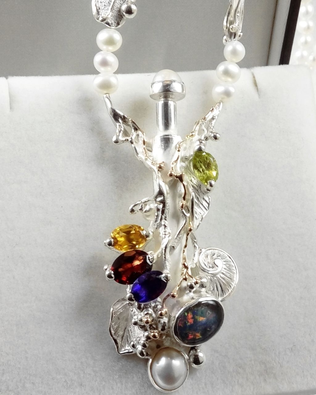 gregory pyra piro perfume bottle pendant #4401, handcrafted jewelry in silver with stones, retro handcrafted jewelry, silver and gold jewelry with gemstones for women, gold and silver jewelry with natural pearls and gemstones, jewellery handcrafted by artisan, jewellery handcrafted from gold and silver, perfume bottle made from silver and gold, perfume bottle with pearls, perfume bottle pendant, jewellery with opal and gemstones, pendant with amethyst and garnet, pendant with citrine and garnet, necklace with pearls and faceted gemstones, necklace with pearls and opal