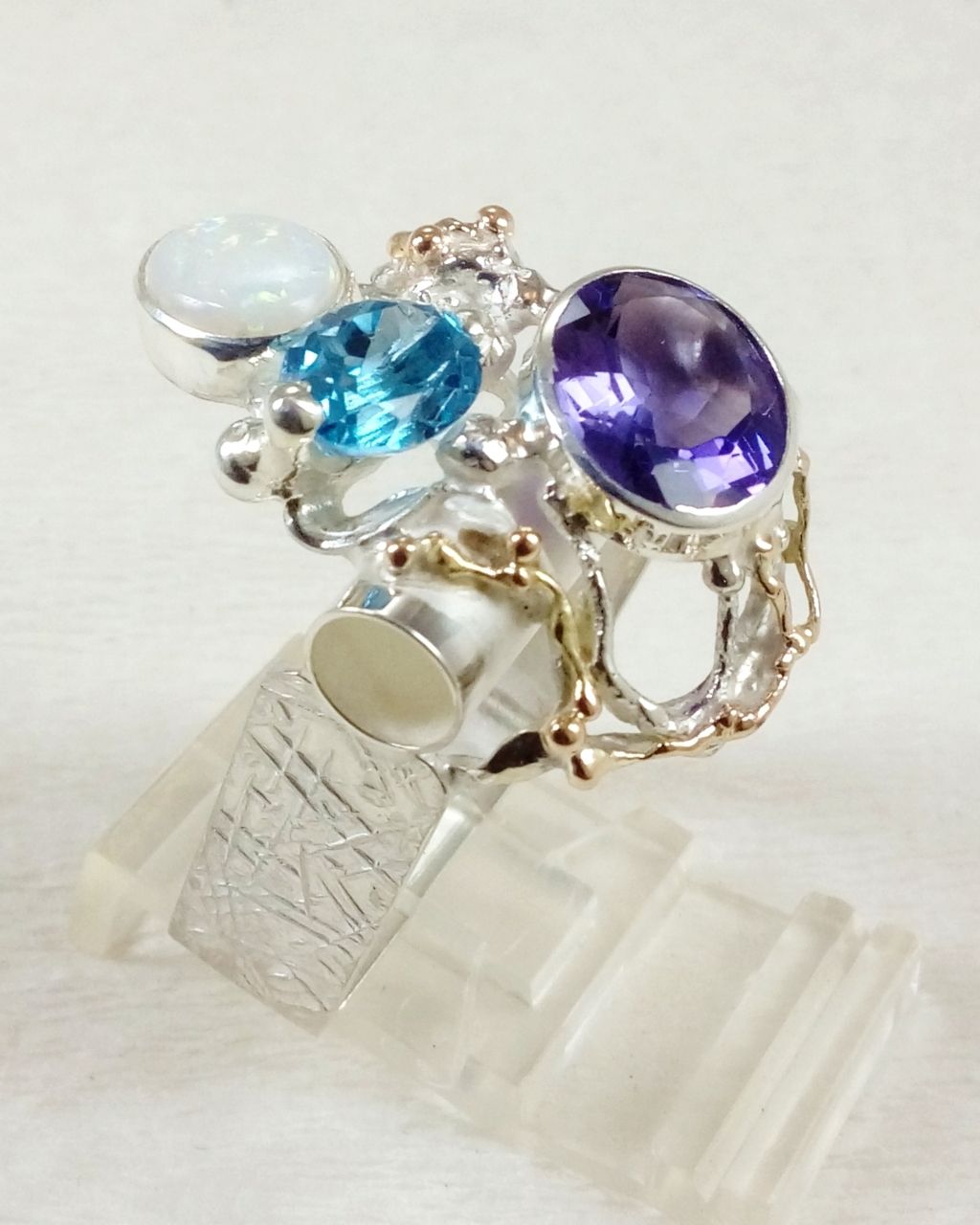 gregory pyra piro art jewelry, jewelry similar to american art, handcrafted ring 2055, ring with amethyst and blue topaz, ring with opal and gemstones, rings sold in art galleries, rings handmade by artist, jewelry gift for mom who likes retro style, handmade gifts and jewelry for mom who likes antiques and retro fashion, jewellery like at the desire fair