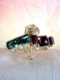 unique design ring with biwa pearl and emerald cut garnet, contemporary jewelry with biwa pearl and emerald cut iolite, original handcrafted ring with amethyst and garnet, sterling silver and 14 karat gold ring with garnet and iolite, sterling silver and 14 karat gold ring with amethyst and garnet, contemporary jewelry with amethyst and pearl, sterling silver and 14 karat gold art jewelry with amethyst and garnet, unique design ring with iolite and pearl, gregory pyra piro ring 7439
