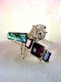 unique design ring with biwa pearl and emerald cut garnet, contemporary jewelry with biwa pearl and emerald cut iolite, original handcrafted ring with amethyst and garnet, sterling silver and 14 karat gold ring with garnet and iolite, sterling silver and 14 karat gold ring with amethyst and garnet, contemporary jewelry with amethyst and pearl, sterling silver and 14 karat gold art jewelry with amethyst and garnet, unique design ring with iolite and pearl, gregory pyra piro ring 7439