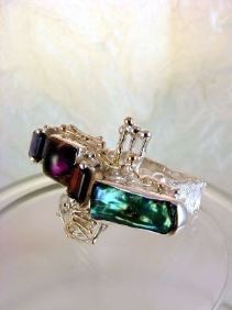 unique design ring with biwa pearl and emerald cut garnet, contemporary jewelry with biwa pearl and emerald cut iolite, original handcrafted ring with amethyst and garnet, sterling silver and 14 karat gold ring with garnet and iolite, sterling silver and 14 karat gold ring with amethyst and garnet, contemporary jewelry with amethyst and pearl, sterling silver and 14 karat gold art jewelry with amethyst and garnet, unique design ring with iolite and pearl, gregory pyra piro ring 7439