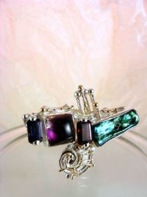 unique design ring with biwa pearl and emerald cut garnet, contemporary jewelry with biwa pearl and emerald cut iolite, original handcrafted ring with amethyst and garnet, sterling silver and 14 karat gold ring with garnet and iolite, sterling silver and 14 karat gold ring with amethyst and garnet, contemporary jewelry with amethyst and pearl, sterling silver and 14 karat gold art jewelry with amethyst and garnet, unique design ring with iolite and pearl, gregory pyra piro ring 7439