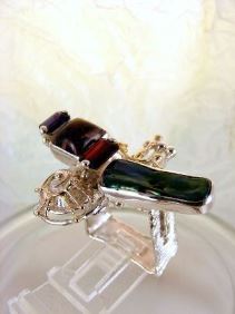 unique design ring with biwa pearl and emerald cut garnet, contemporary jewelry with biwa pearl and emerald cut iolite, original handcrafted ring with amethyst and garnet, sterling silver and 14 karat gold ring with garnet and iolite, sterling silver and 14 karat gold ring with amethyst and garnet, contemporary jewelry with amethyst and pearl, sterling silver and 14 karat gold art jewelry with amethyst and garnet, unique design ring with iolite and pearl, gregory pyra piro ring 7439