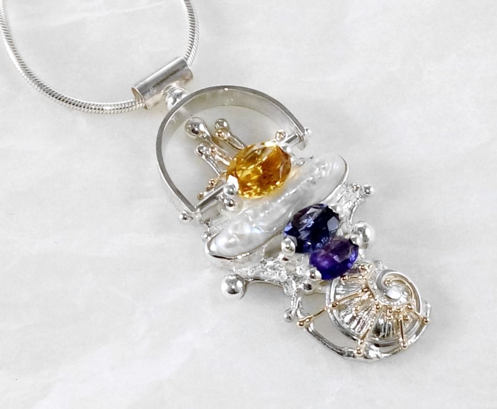 gregory pyra piro handgemaakte sieraden, exclusieve design sieraden, unieke design sieraden, sculpturale sieraden in goud en zilver, unieke sieraden voor vrouwen met edelstenen