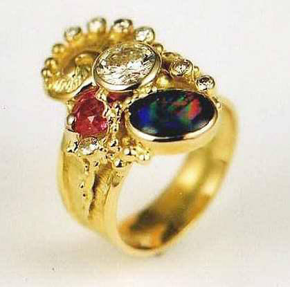 jewelry with semi precious stones, jewelry with facet cut gemstones, jewelry with natural pearls, jewelry with natural stones and pearl, Gregory Pyra Piro ring, 18 karat gold, opal, ruby, diamond