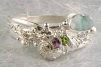 jewelry shown in international jewelry fairs and and exhibitions, bracelet handcrafted and made by artist, bracelets sold in art and craft galleries, mixed metal handcrafted jewelry, bracelet made from silver and gold, gregory pyra piro handcrafted bracelet 3492