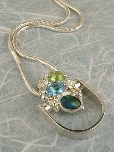 artisan made handcrafted jewelry,, jewellery with colour stones, jewellery with natural gemstones, jewellery with real pearls, where to buy jewellery for mature womens, jewellery from mixed metals with gemstones, handcrafted pendant with opal 7362