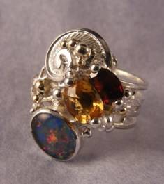 Gregory Pyra Piro artisan original handcrafted ring #3826, fine craft gallery handcrafted ring for sale, handcrafted ring from sterling silver and gold with opal and garnet, handcrafted ring from gold and silver with opal and citrine