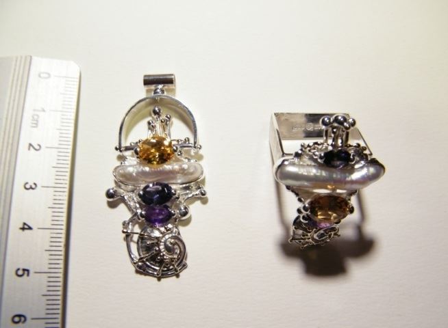 gregory pyra piro en av ett slag original handgjorda konst smycken i silver och guld med ädelstenar och pärlor