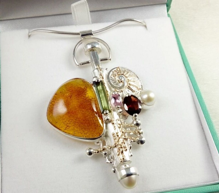 one of a kind collectibles, sterling silver perfume bottle, sterling silver amphora, gregory pyra piro perfume bottle pendant 365429, mixed metal pendant made from gold and silver, pendants and jewelry in art and craft galleies, jewelry and pendants shown in international exhibitions and shows, handmade pendant with amber and green tourmaline, handcrafted pendant with pink tourmaline and amber