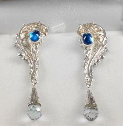 fine craft gallery earrings for sale, fine craft gallery artisan jewellery for sale, gregory pyra piro handcrafted earrings 8321, silver and gold earrings with moonstone and blue topaz, reticulated and soldered jewellery with faceted gemstones, silver and gold reticulated jewellery