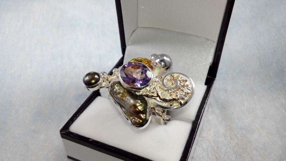 original maker's handcrafted jewellery, gregory pyra piro ring 1565, sterling silver, gold, peridot, citrine, amethyst, pearls, art nouveau inspired fashion jewelry, handcrafted jewelry with antique motif, where to find art nouveau inspired fashion jewelry, fine jewellery instpired by retro fashion, jewellery and antique shops, shop for antiques and jewellery, shop for vintage jewellery, are there still artists and designers who make jewelry the old fashioned way, where to find contemporary jewelry with an antique motif, art and craft gallery artisan handcrafted jewellery for sale, jewellery with ocean and seashell theme