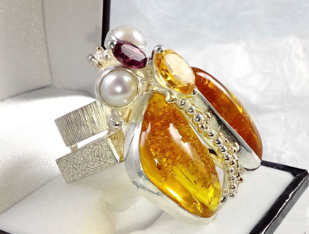 jewelry with semi precious stones, jewelry that has solid 14 karat gold, facet cut gemstones in jewelry, gregory pyra piro cyber ring Nr. 43926, handgefertigte Ringe in Kunstgalerien, handgefertigte Ringe in Handwerksgalerien, Silber und Gold gemischter Metallschmuck, Ring mit Bernstein und Rhodolit, Ring mit Citrin und Granat, Ring mit Bernstein und Perler, Schmuckkunst Original Handgefertigt