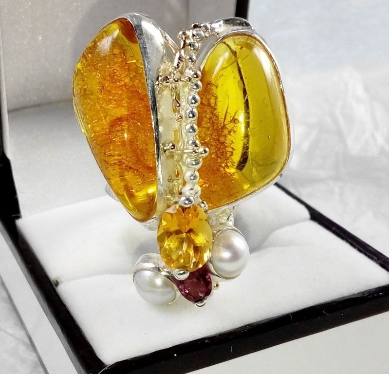gregory pyra piro cyber ring 43926, mixed metal jewellery in silver and gold, rings in art and craft galleries, cyber ring with amber and rhodolite garnet, cyber ring with citrine and garnet, cyber ring with amber and pearl