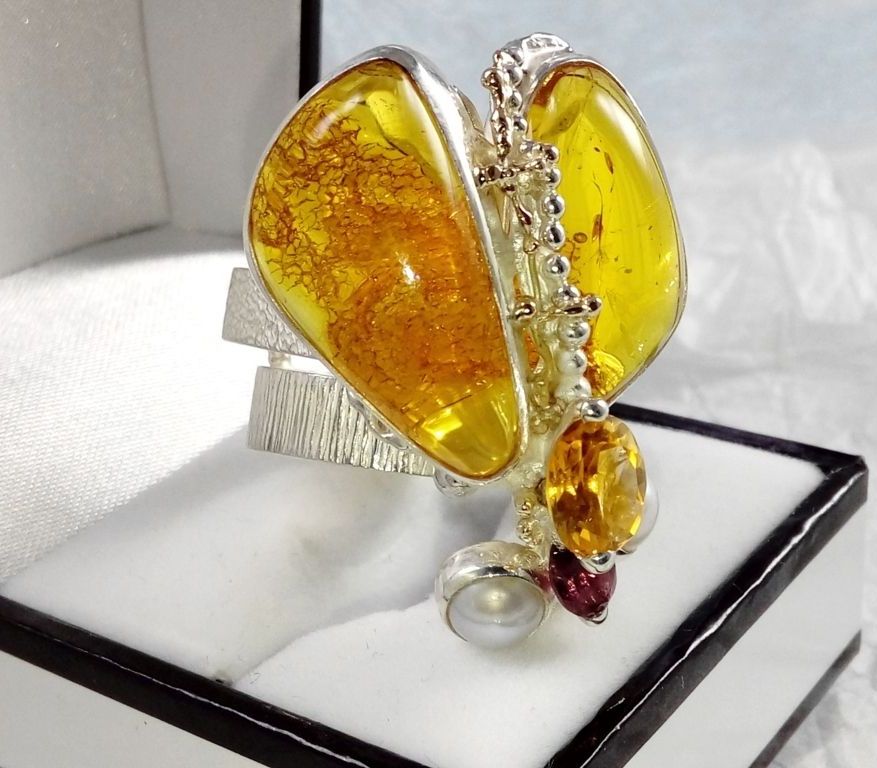 jewelry with semi precious stones, jewelry that has solid 14 karat gold, facet cut gemstones in jewelry, gregory pyra piro cyber ring Nr. 43926, handgefertigte Ringe in Kunstgalerien, handgefertigte Ringe in Handwerksgalerien, Silber und Gold gemischter Metallschmuck, Ring mit Bernstein und Rhodolit, Ring mit Citrin und Granat, Ring mit Bernstein und Perler, Schmuckkunst Original Handgefertigt