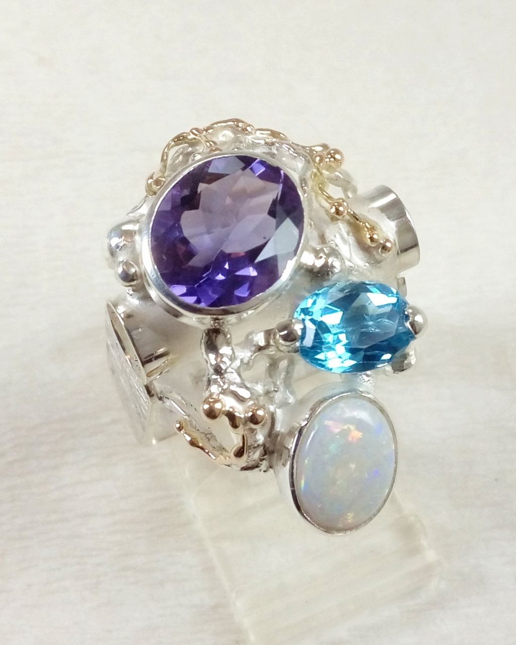 gregory pyra piro art jewelry, jewelry similar to american art, handcrafted ring 2055, ring with amethyst and blue topaz, ring with opal and gemstones, rings sold in art galleries, rings handmade by artist, jewelry gift for mom who likes retro style, handmade gifts and jewelry for mom who likes antiques and retro fashion, jewellery like at the desire fair