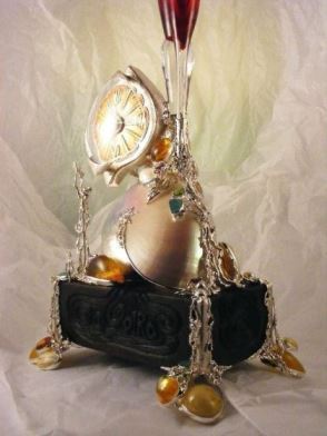 Gregory Pyra Piro Clock Sculpture in Oakwood, Sterling Silver, 14 Karat Gold, and Enamel with Nautilus Shell, Drusy, Amber, Facet Cut Garnet, Facet Cut Peridot, and Pearls