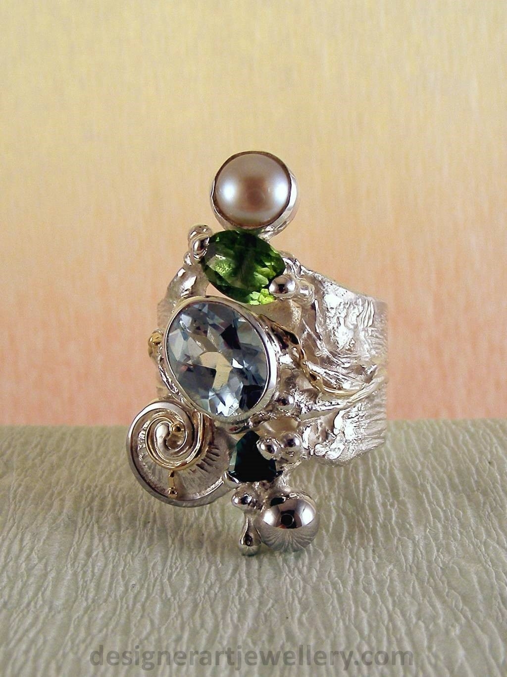gregory pyra piro handcrafted ring 1441, ring made from silver and gold with gemstones and pearls, jewellery auctions with rings and collectibles and jewellery shown in art and craft galleries, handcrafted rings for women with blue topaz and peridot, handcrafted rings for women with green tourmaline and pearl