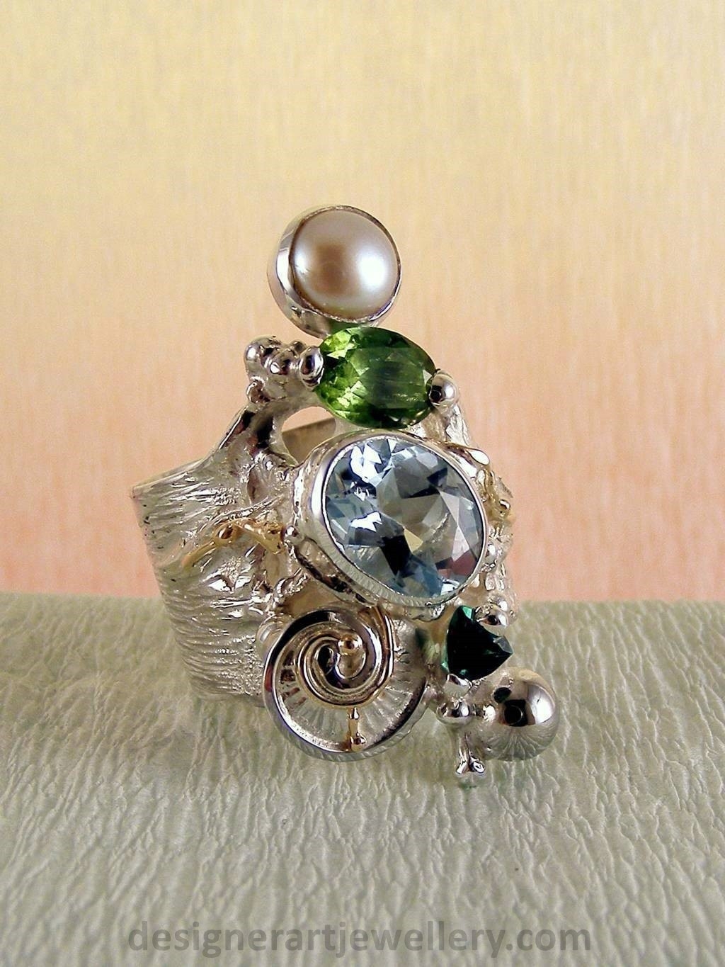 gregory pyra piro handcrafted ring 1441, ring made from silver and gold with gemstones and pearls, jewellery auctions with rings and collectibles and jewellery shown in art and craft galleries, handcrafted rings for women with blue topaz and peridot, handcrafted rings for women with green tourmaline and pearl