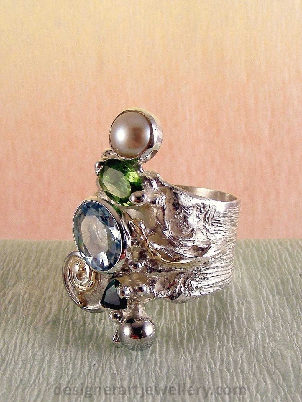gregory pyra piro handcrafted ring 1441, ring made from silver and gold with gemstones and pearls, jewellery auctions with rings and collectibles and jewellery shown in art and craft galleries, handcrafted rings for women with blue topaz and peridot, handcrafted rings for women with green tourmaline and pearl