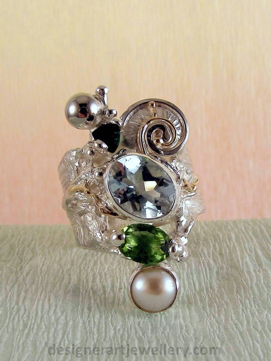 gregory pyra piro handcrafted ring 1441, ring made from silver and gold with gemstones and pearls, jewellery auctions with rings and collectibles and jewellery shown in art and craft galleries, handcrafted rings for women with blue topaz and peridot, handcrafted rings for women with green tourmaline and pearl