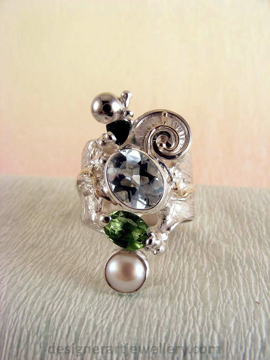 gregory pyra piro handcrafted ring 1441, ring made from silver and gold with gemstones and pearls, jewellery auctions with rings and collectibles and jewellery shown in art and craft galleries, handcrafted rings for women with blue topaz and peridot, handcrafted rings for women with green tourmaline and pearl