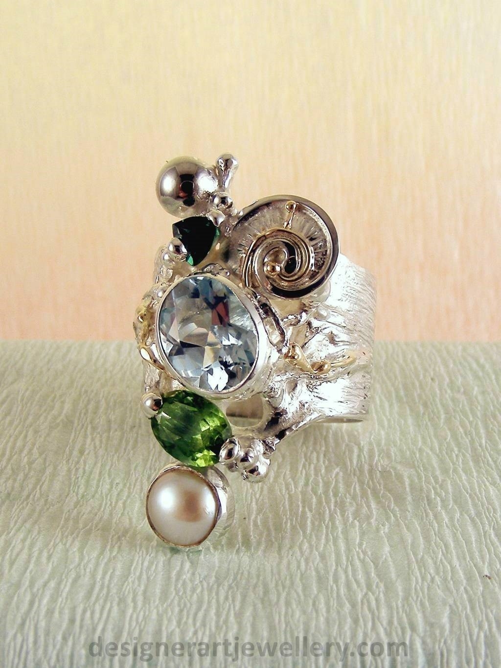 gregory pyra piro handcrafted ring 1441, ring made from silver and gold with gemstones and pearls, jewellery auctions with rings and collectibles and jewellery shown in art and craft galleries, handcrafted rings for women with blue topaz and peridot, handcrafted rings for women with green tourmaline and pearl