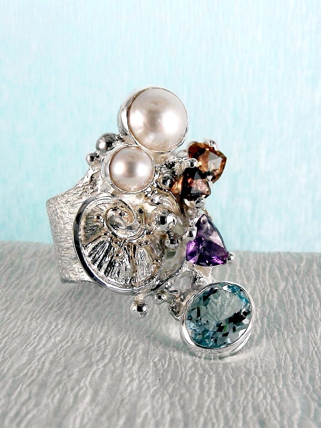 wearable art jewelry, jewelry to wear, jewelry made to orderGregory Pyra Piro ring 2050, rings for women with blue topaz and pink tourmaline, rings for women with amethyst and blue topaz, rings for women with pink tourmaline and pearl, rings for women with blue topaz and pearl, mixed metal rings in silver and gold, rings in art and craft galleries