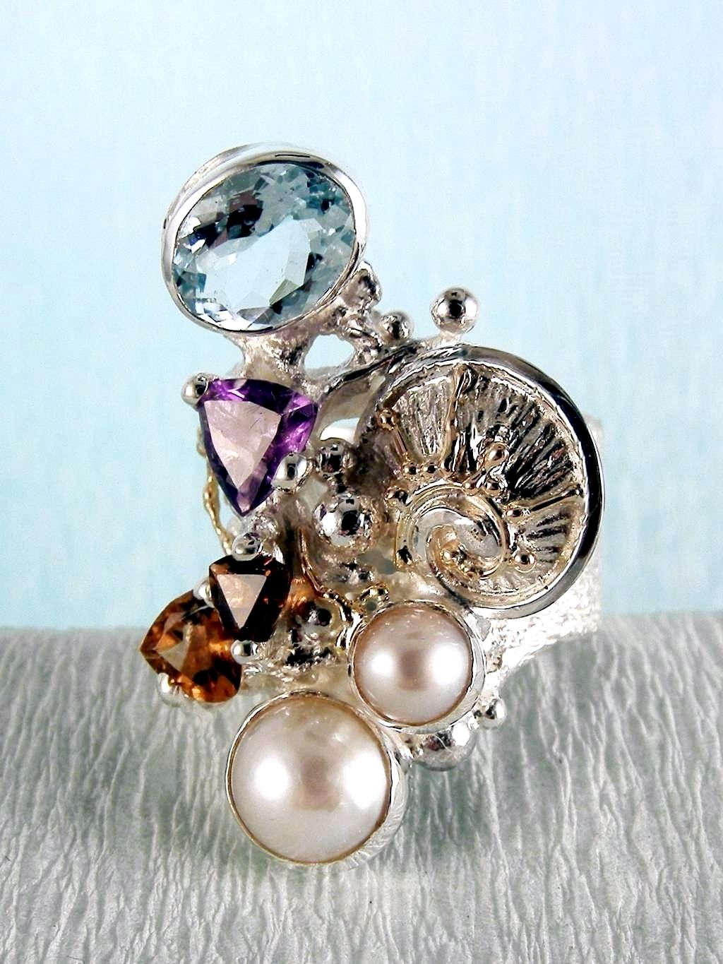 wearable art jewelry, jewelry to wear, jewelry made to orderGregory Pyra Piro ring 2050, rings for women with blue topaz and pink tourmaline, rings for women with amethyst and blue topaz, rings for women with pink tourmaline and pearl, rings for women with blue topaz and pearl, mixed metal rings in silver and gold, rings in art and craft galleries