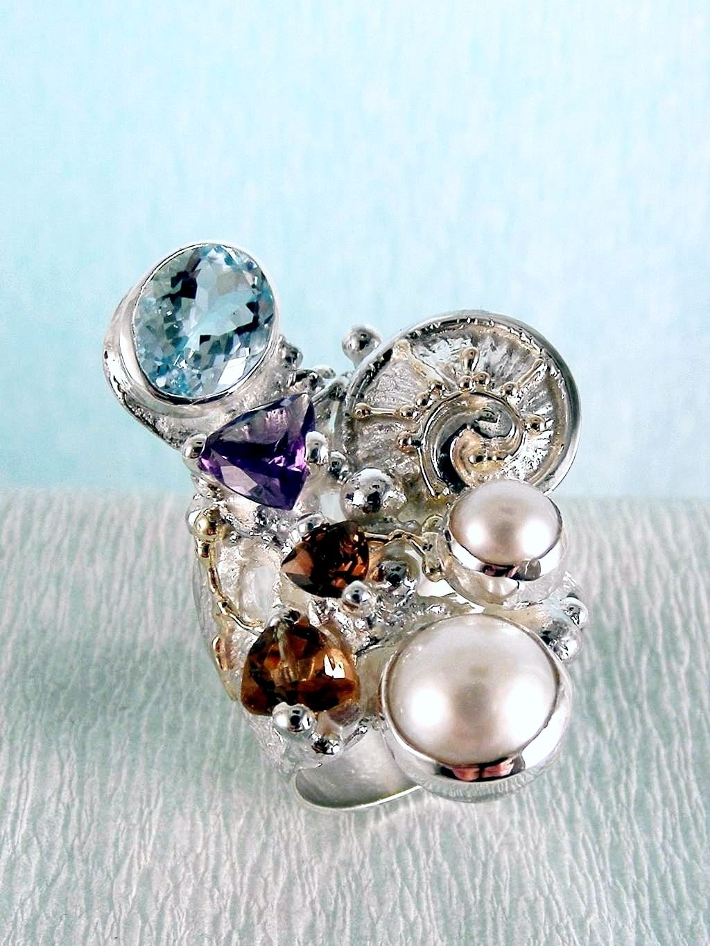 wearable art jewelry, jewelry to wear, jewelry made to orderGregory Pyra Piro ring 2050, rings for women with blue topaz and pink tourmaline, rings for women with amethyst and blue topaz, rings for women with pink tourmaline and pearl, rings for women with blue topaz and pearl, mixed metal rings in silver and gold, rings in art and craft galleries