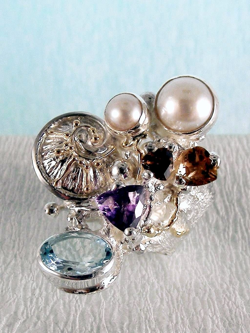 wearable art jewelry, jewelry to wear, jewelry made to orderGregory Pyra Piro ring 2050, rings for women with blue topaz and pink tourmaline, rings for women with amethyst and blue topaz, rings for women with pink tourmaline and pearl, rings for women with blue topaz and pearl, mixed metal rings in silver and gold, rings in art and craft galleries