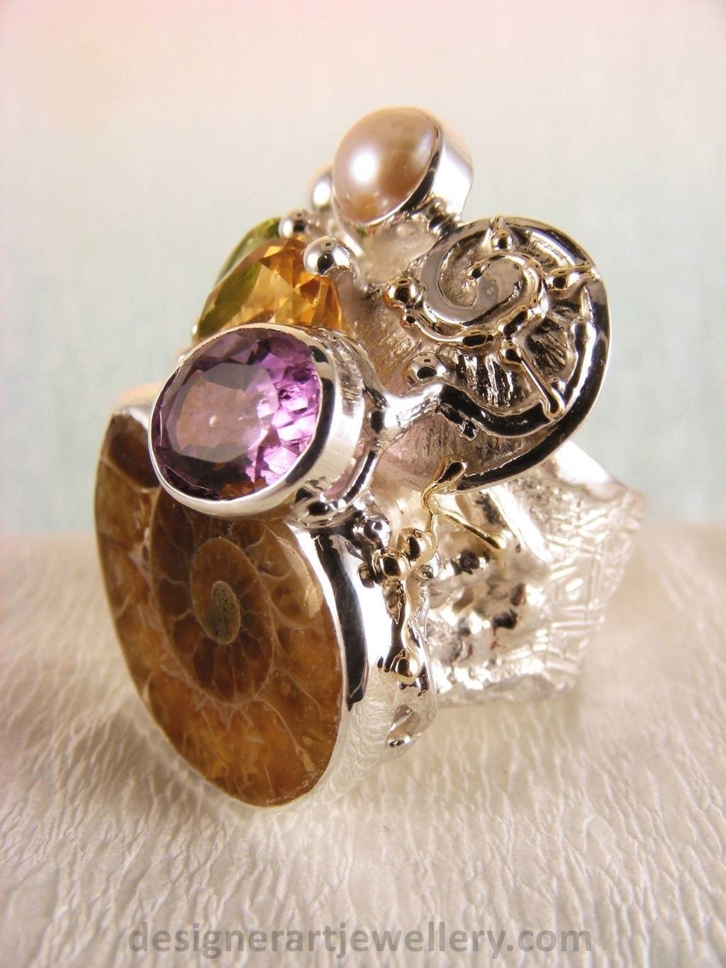 wearable art jewelry to wear, meticulously handcrafted jewelry, sterling silver and 14k gold jewelry with semi precious stones, jewelry to wear with luxury brands, jewellery to wear with luxury brands, jewellery to wear with fashion brands, jewellery to wear with brand bags, unique combinations with gemstones, contemporary jewelry with moonstone and pearl, art jewelry with facet cut garnet and pearl, sterling silver and 14 karat gold ring with facet cut garnet and pearl, unique design jewelry with pearl and moonstone, one of a kind jewellery, handmade artisan jewellery, mixed metal artisan jewellery, artisan jewellery with gemstones and pearls, gregory pyra piro band ring 5240