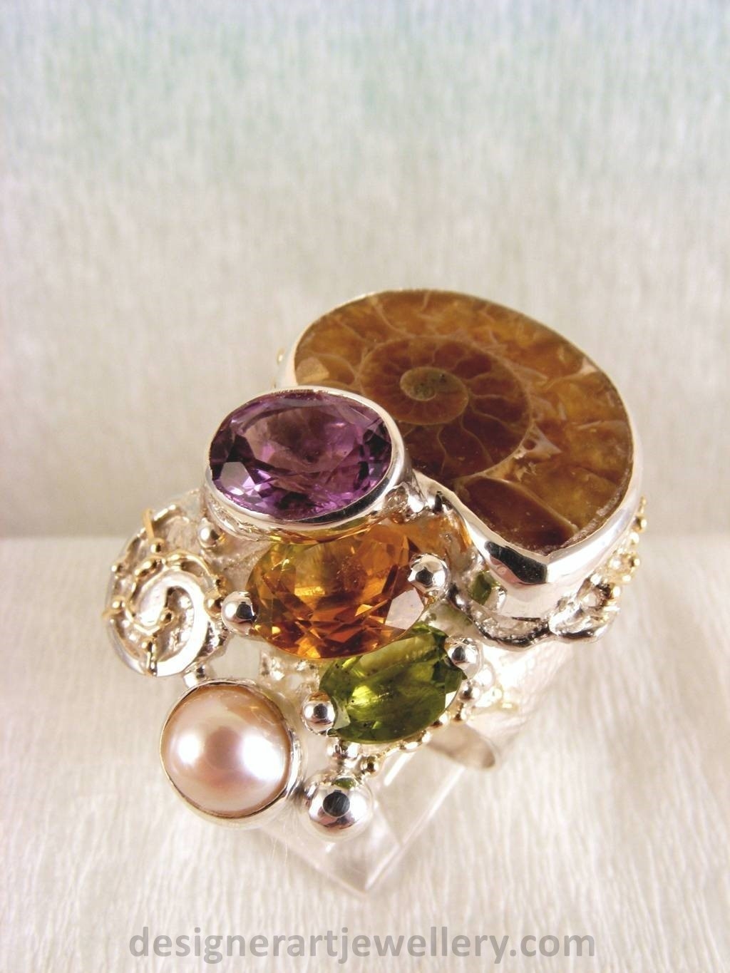 wearable art jewelry to wear, meticulously handcrafted jewelry, sterling silver and 14k gold jewelry with semi precious stones, jewelry to wear with luxury brands, jewellery to wear with luxury brands, jewellery to wear with fashion brands, jewellery to wear with brand bags, unique combinations with gemstones, contemporary jewelry with moonstone and pearl, art jewelry with facet cut garnet and pearl, sterling silver and 14 karat gold ring with facet cut garnet and pearl, unique design jewelry with pearl and moonstone, one of a kind jewellery, handmade artisan jewellery, mixed metal artisan jewellery, artisan jewellery with gemstones and pearls, gregory pyra piro band ring 5240