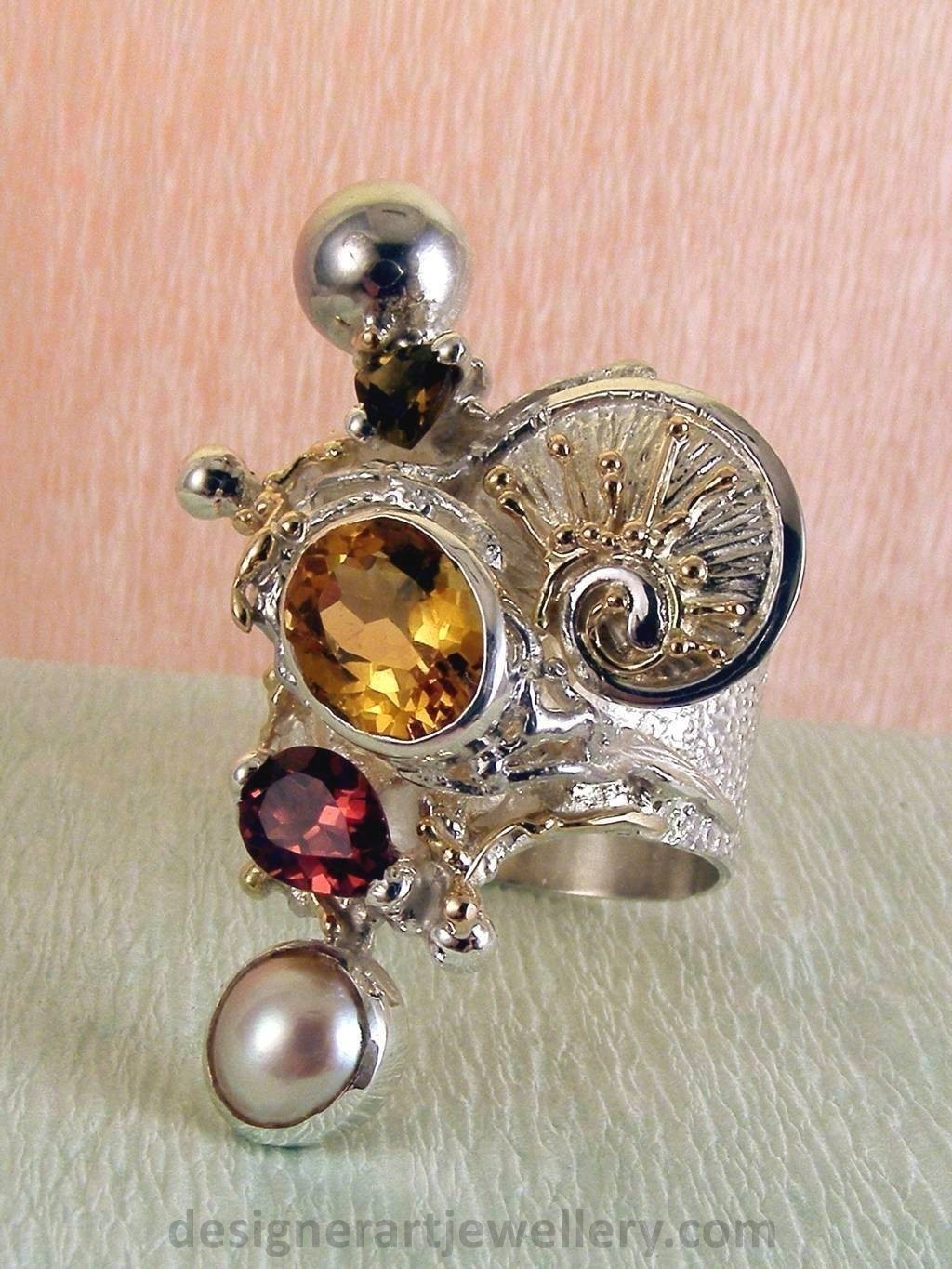 wearable art jewelry, jewelry to wear, jewelry made to orderGregory Pyra Piro ring 9435, rings for women with citrine and garnet, sterling silver and gold mixed metal jewellery, rings for women with citrine and green tourmaline, rings for women with garnet and pearl, rings for women with tourmaline and pearl, handcrafted jewelry and rings sold in art and craft galleries, jewellery auctions with rings and collectibles shown in trade fairs and jewelry shows