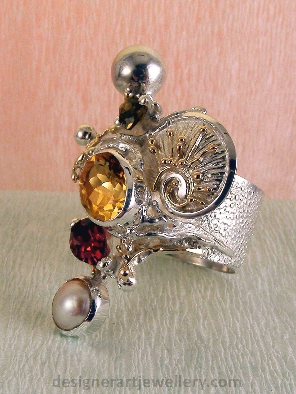 wearable art jewelry, jewelry to wear, jewelry made to orderGregory Pyra Piro ring 9435, rings for women with citrine and garnet, sterling silver and gold mixed metal jewellery, rings for women with citrine and green tourmaline, rings for women with garnet and pearl, rings for women with tourmaline and pearl, handcrafted jewelry and rings sold in art and craft galleries, jewellery auctions with rings and collectibles shown in trade fairs and jewelry shows
