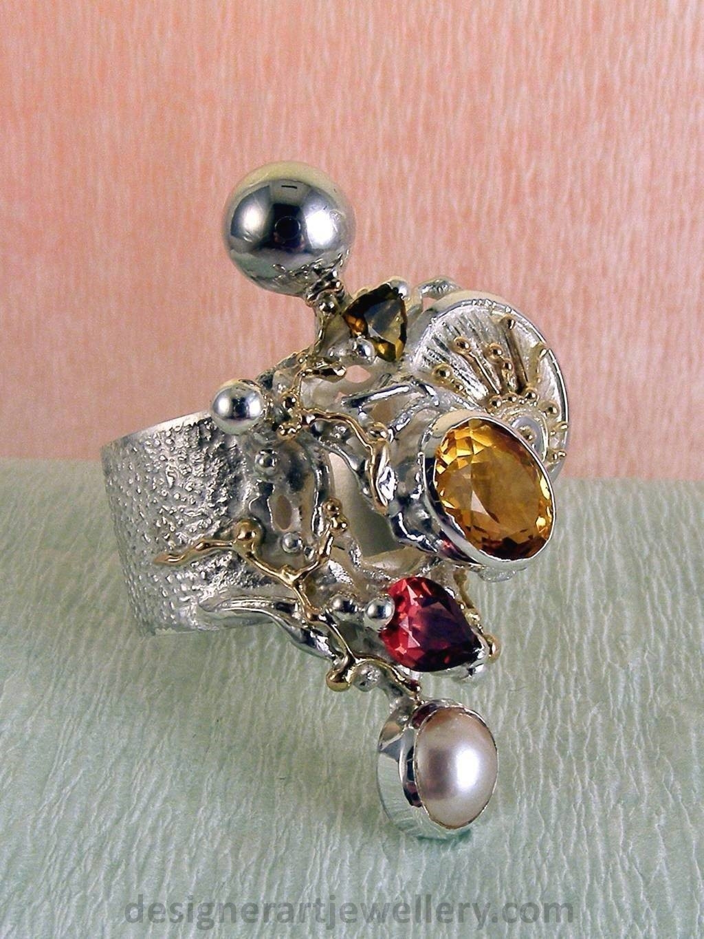 wearable art jewelry, jewelry to wear, jewelry made to orderGregory Pyra Piro ring 9435, rings for women with citrine and garnet, sterling silver and gold mixed metal jewellery, rings for women with citrine and green tourmaline, rings for women with garnet and pearl, rings for women with tourmaline and pearl, handcrafted jewelry and rings sold in art and craft galleries, jewellery auctions with rings and collectibles shown in trade fairs and jewelry shows
