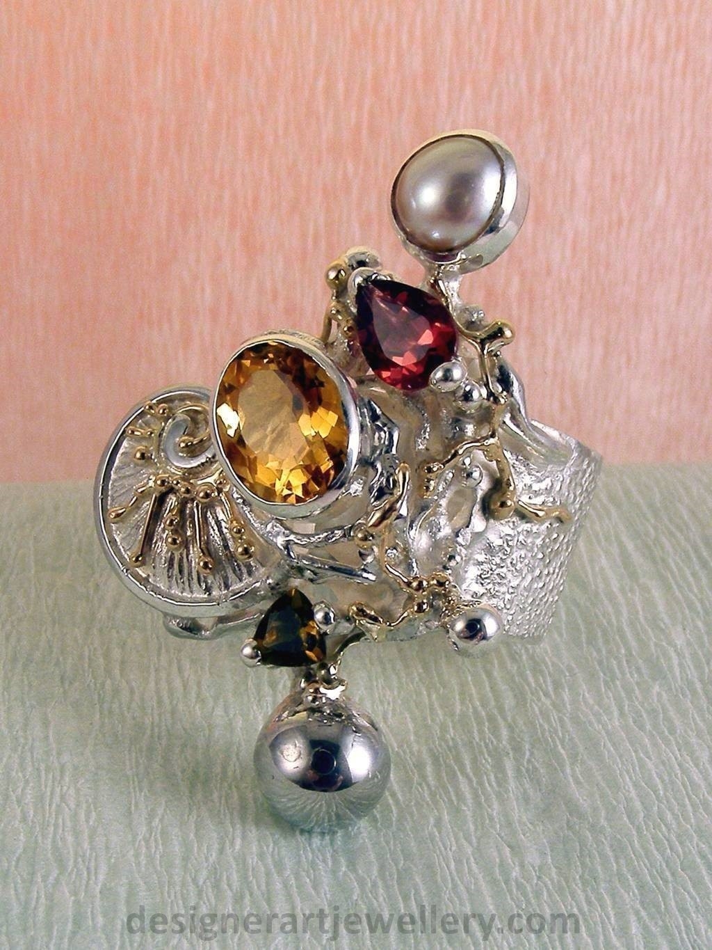 wearable art jewelry, jewelry to wear, jewelry made to orderGregory Pyra Piro ring 9435, rings for women with citrine and garnet, sterling silver and gold mixed metal jewellery, rings for women with citrine and green tourmaline, rings for women with garnet and pearl, rings for women with tourmaline and pearl, handcrafted jewelry and rings sold in art and craft galleries, jewellery auctions with rings and collectibles shown in trade fairs and jewelry shows