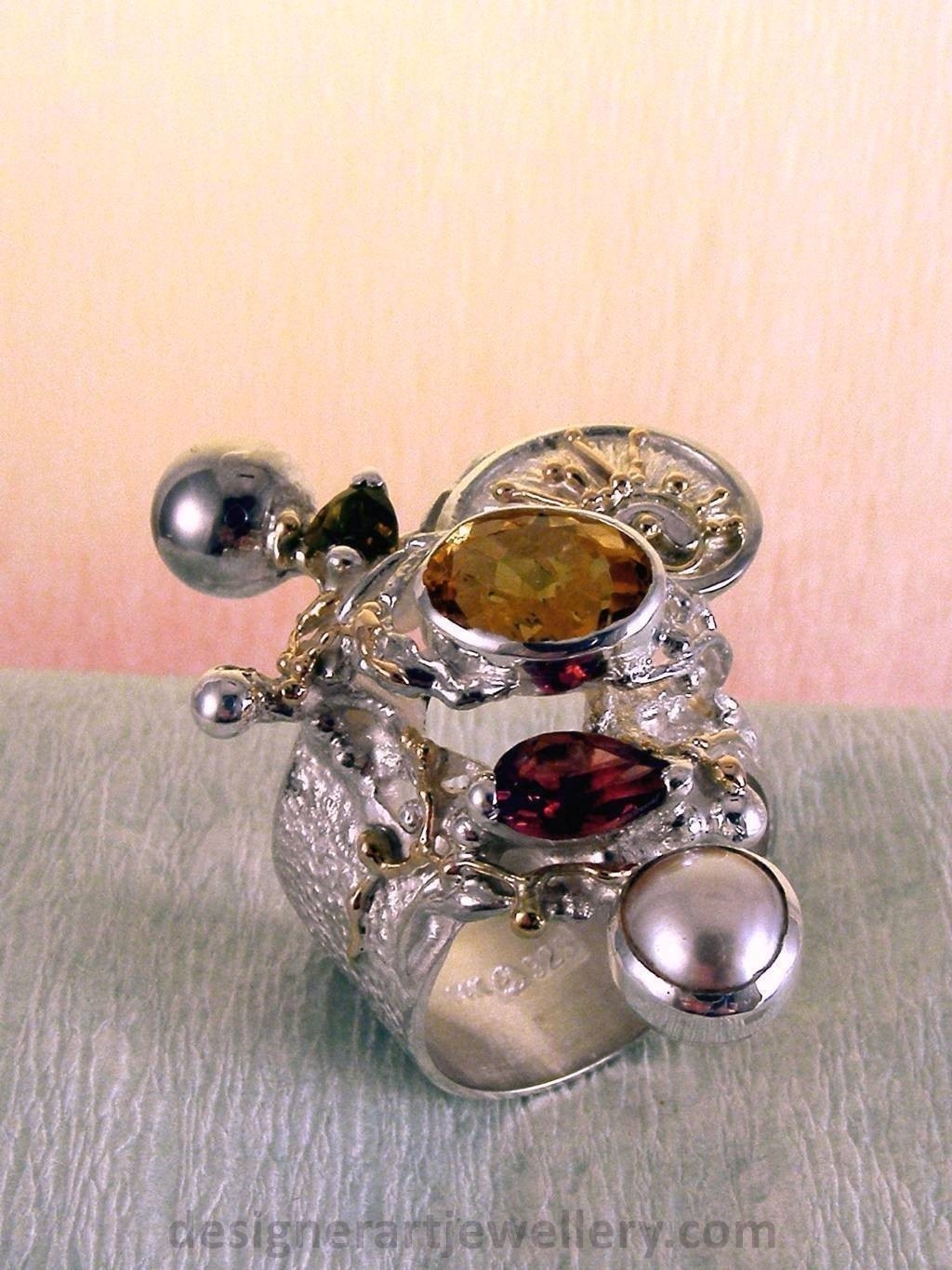wearable art jewelry, jewelry to wear, jewelry made to orderGregory Pyra Piro ring 9435, rings for women with citrine and garnet, sterling silver and gold mixed metal jewellery, rings for women with citrine and green tourmaline, rings for women with garnet and pearl, rings for women with tourmaline and pearl, handcrafted jewelry and rings sold in art and craft galleries, jewellery auctions with rings and collectibles shown in trade fairs and jewelry shows