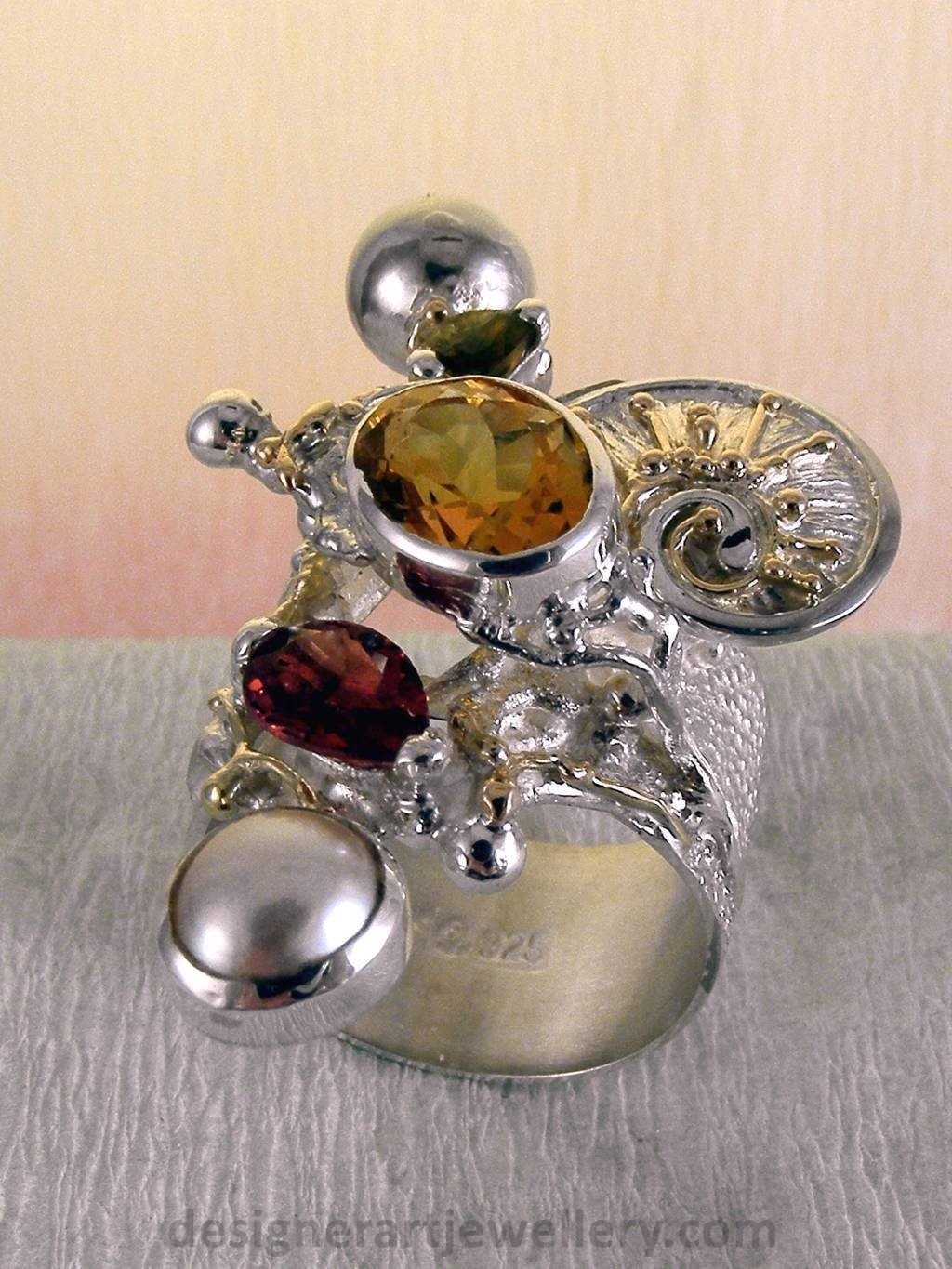 wearable art jewelry, jewelry to wear, jewelry made to orderGregory Pyra Piro ring 9435, rings for women with citrine and garnet, sterling silver and gold mixed metal jewellery, rings for women with citrine and green tourmaline, rings for women with garnet and pearl, rings for women with tourmaline and pearl, handcrafted jewelry and rings sold in art and craft galleries, jewellery auctions with rings and collectibles shown in trade fairs and jewelry shows
