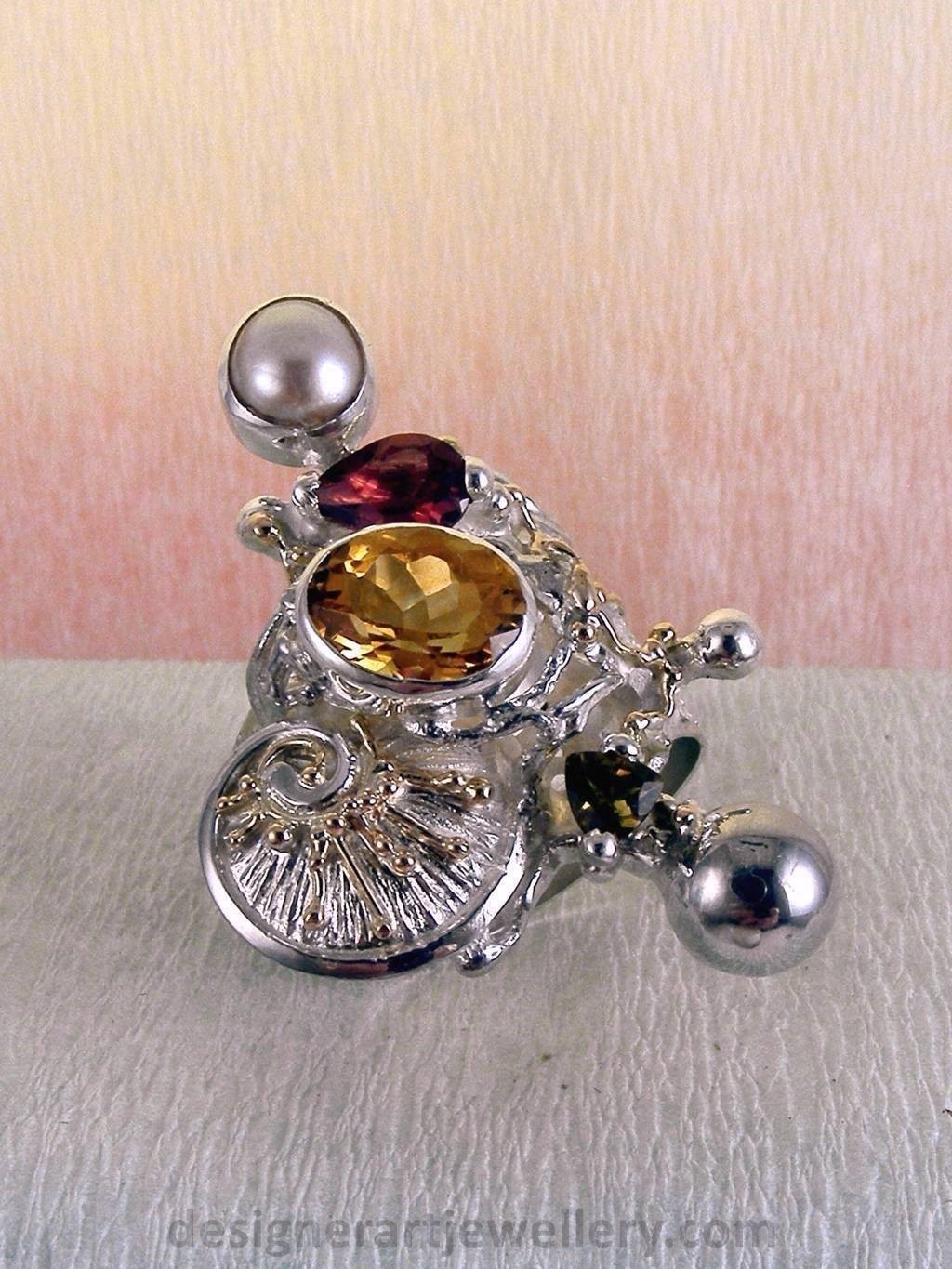 wearable art jewelry, jewelry to wear, jewelry made to orderGregory Pyra Piro ring 9435, rings for women with citrine and garnet, sterling silver and gold mixed metal jewellery, rings for women with citrine and green tourmaline, rings for women with garnet and pearl, rings for women with tourmaline and pearl, handcrafted jewelry and rings sold in art and craft galleries, jewellery auctions with rings and collectibles shown in trade fairs and jewelry shows
