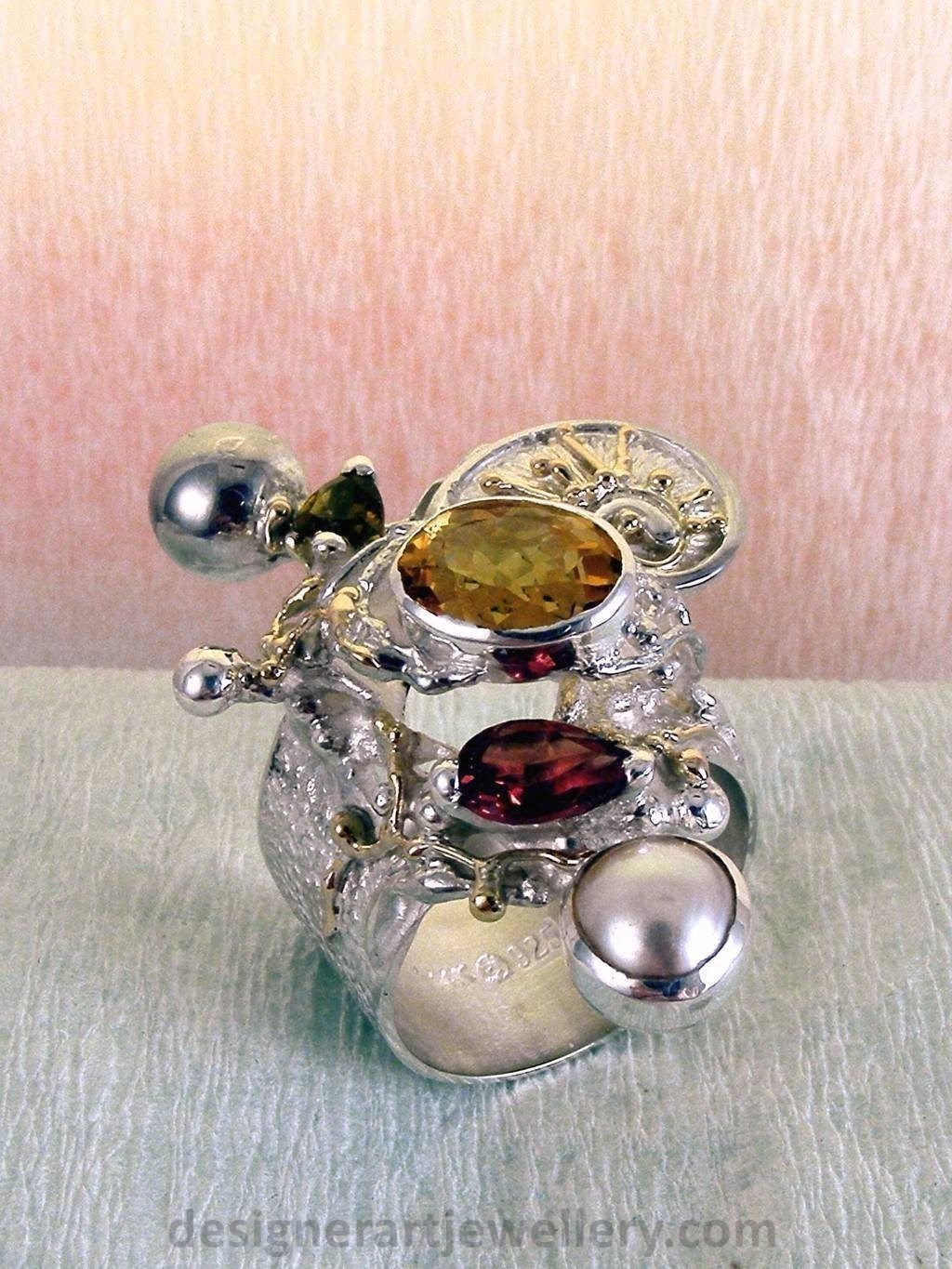 wearable art jewelry, jewelry to wear, jewelry made to orderGregory Pyra Piro ring 9435, rings for women with citrine and garnet, sterling silver and gold mixed metal jewellery, rings for women with citrine and green tourmaline, rings for women with garnet and pearl, rings for women with tourmaline and pearl, handcrafted jewelry and rings sold in art and craft galleries, jewellery auctions with rings and collectibles shown in trade fairs and jewelry shows