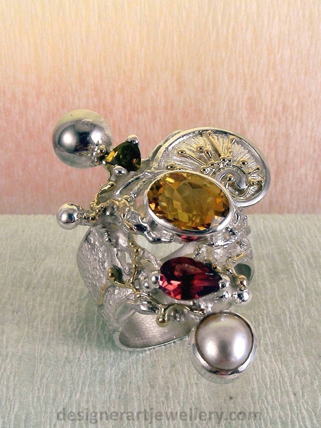 wearable art jewelry, jewelry to wear, jewelry made to orderGregory Pyra Piro ring 9435, rings for women with citrine and garnet, sterling silver and gold mixed metal jewellery, rings for women with citrine and green tourmaline, rings for women with garnet and pearl, rings for women with tourmaline and pearl, handcrafted jewelry and rings sold in art and craft galleries, jewellery auctions with rings and collectibles shown in trade fairs and jewelry shows