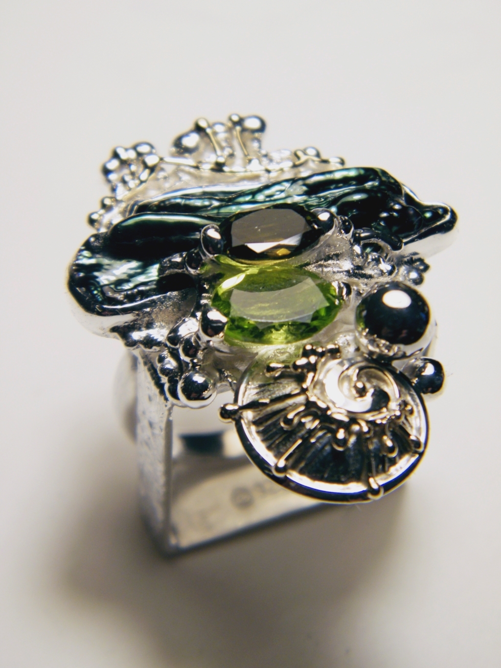 jewellery in art and craft galleries, jewellery and rings shown in international jewellery shows and fairs, one of a kind rings handmade by artist, gregory pyra piro one of a kind square ring #1080, square ring with green tourmaline and peridot, one of a kind ring handmade by artist with green tourmaline and biwa pearl