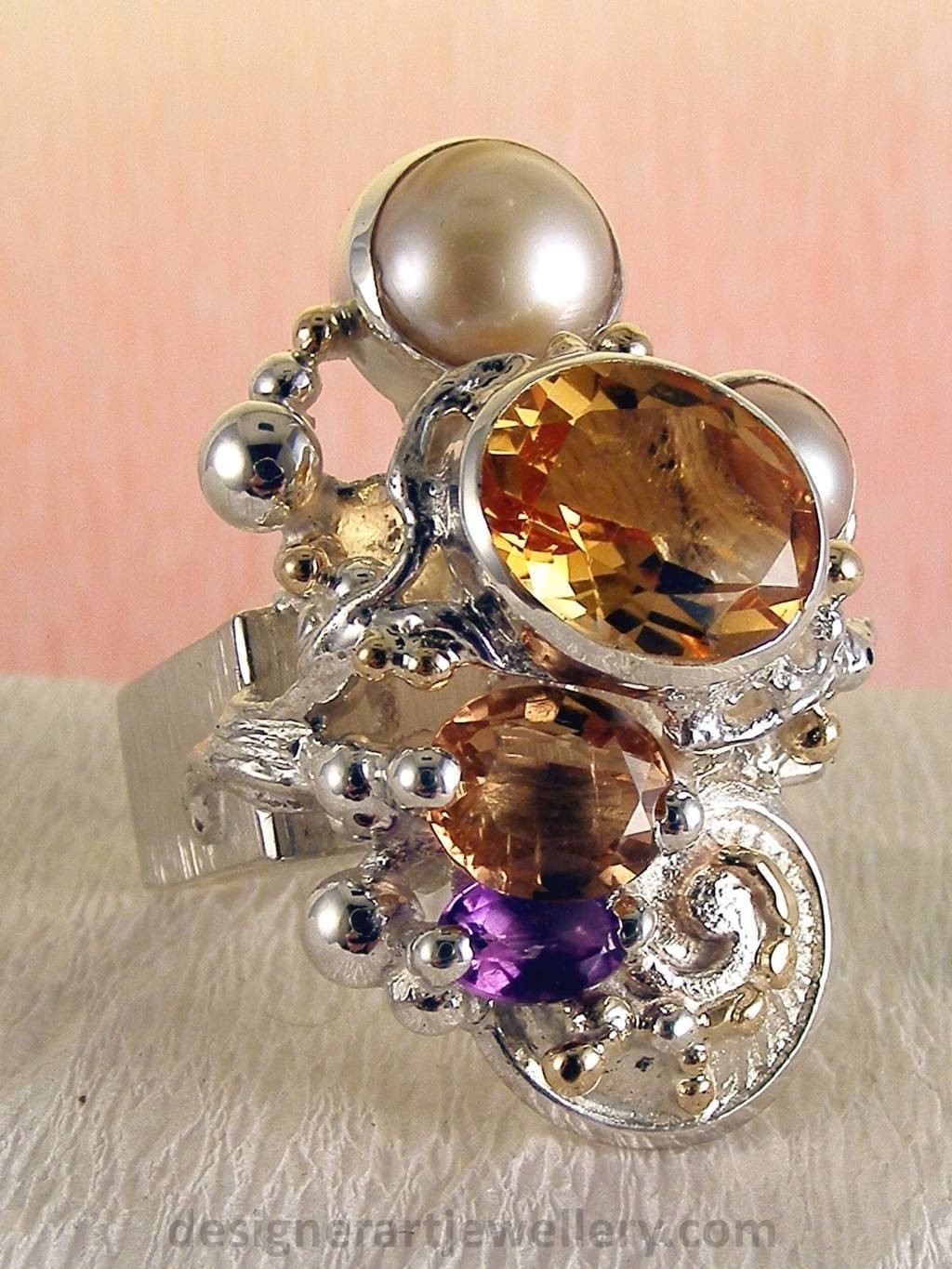 jewelry made from gold and silver, fashion inspired jewelry for women over 40, luxury jewelry shopping, handmade jewelry accessories for women over 50, fashion with elegance over 60 accessoreis and jewelry, jewelry with color stones, jewelry with real pearls, gregory pyra piro square ring 4291, handcrafted jewellery in art and craft galleries, mixed metal handcrafted ring, one of a kind ring in sterling silver and gold, rings for women with pink tourmaline and amethyst, rings for women with pink tourmaline and pearl, rings for women with citrine and pearl