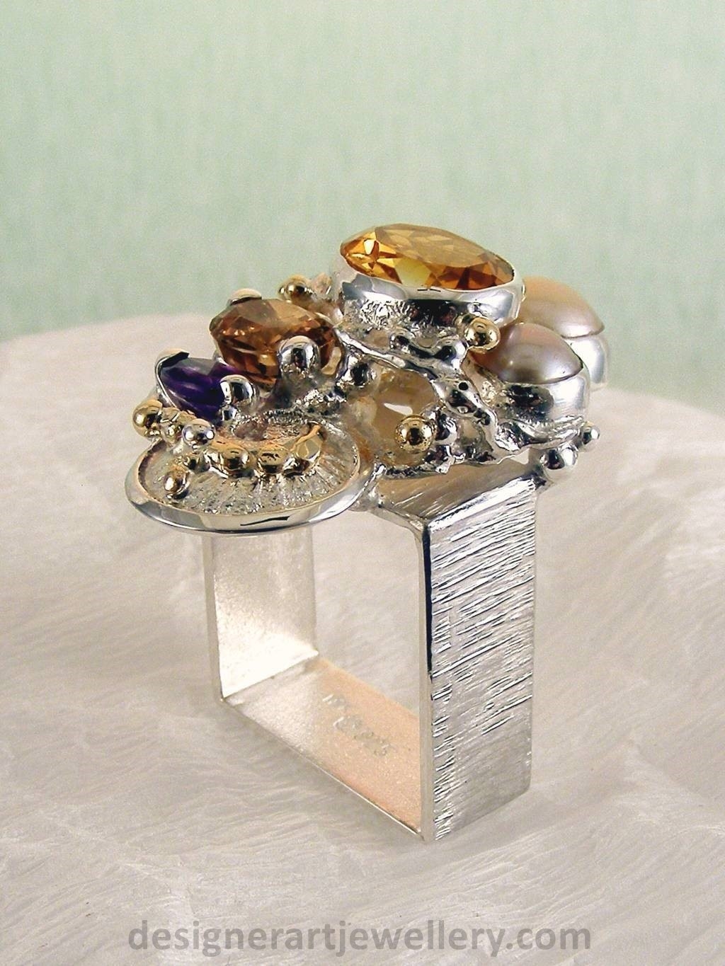 jewelry made from gold and silver, fashion inspired jewelry for women over 40, luxury jewelry shopping, handmade jewelry accessories for women over 50, fashion with elegance over 60 accessoreis and jewelry, jewelry with color stones, jewelry with real pearls, gregory pyra piro square ring 4291, handcrafted jewellery in art and craft galleries, mixed metal handcrafted ring, one of a kind ring in sterling silver and gold, rings for women with pink tourmaline and amethyst, rings for women with pink tourmaline and pearl, rings for women with citrine and pearl